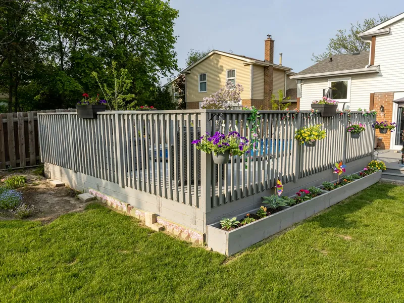 Modern fence and deck installed by My Homes Fencing Expert in an Auckland backyard