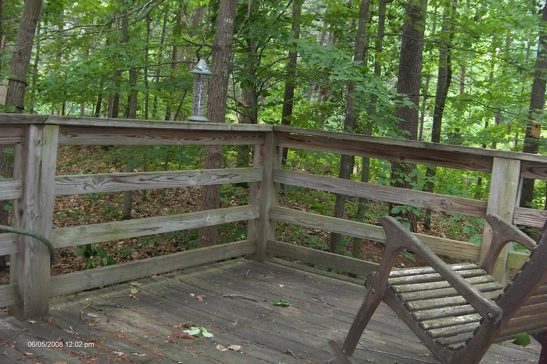 Timber deck railing fence overlooking a garden