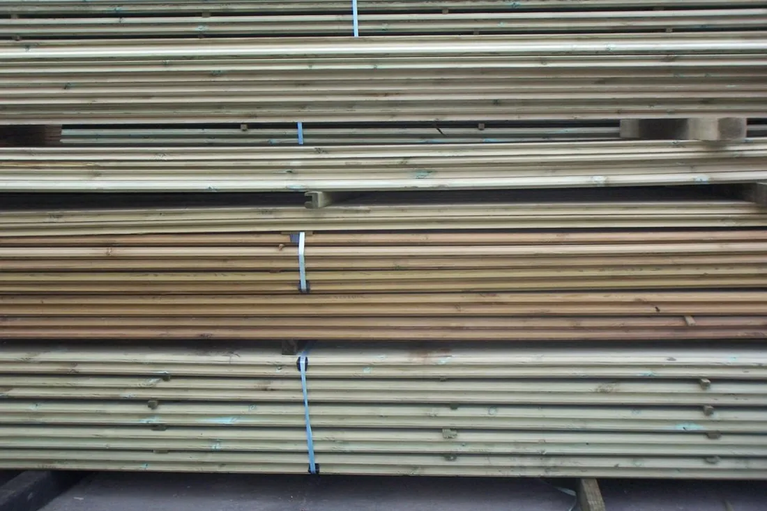 Spray application of fence paint for an even finish